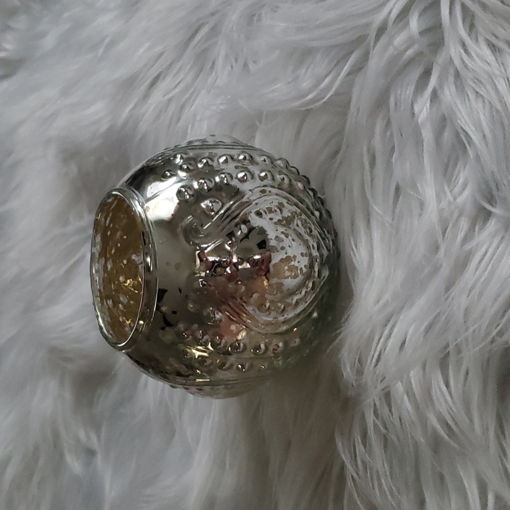 A NWT beautiful mercury glass candle holder made In India!